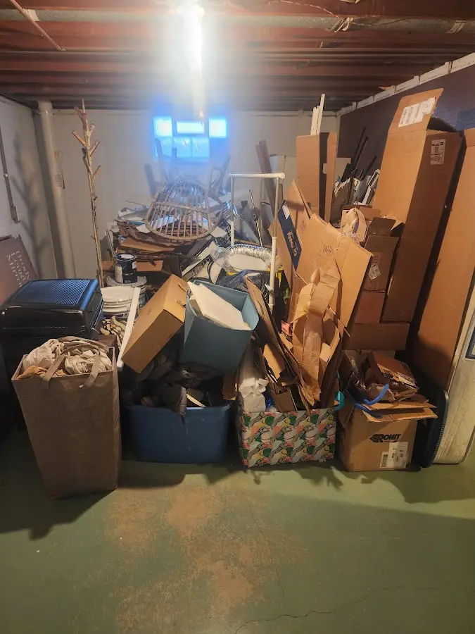 Roll-off dumpster container at job site for 20 Yard Dumpster Rental in Maple Grove